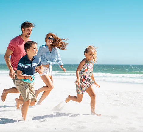 family running on the beach enjoying optimal spf protection with sol brush sunscreen